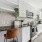 sun-filled kitchen next to large window