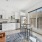 kitchen open to living room and dining area